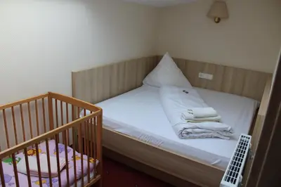 Ein Bett oder Betten in einem Zimmer der Unterkunft Villa Waldeck