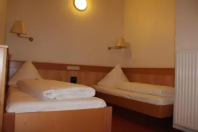 Ein Bett oder Betten in einem Zimmer der Unterkunft Villa Waldeck