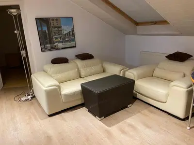 Ein Sitzbereich in der Unterkunft Ferienwohnung Heidelberg ZE-2020-7-WZ