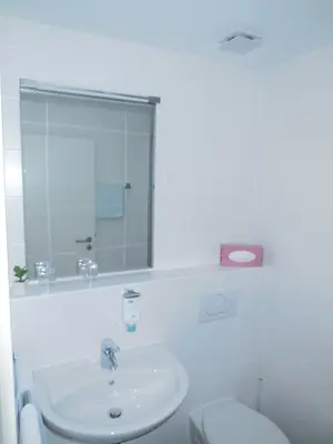 Ein Badezimmer in der Unterkunft Hotel Garni am Hechenberg