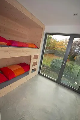 Ein Bett oder Betten in einem Zimmer der Unterkunft Historisches Wohnen modern interpretiert