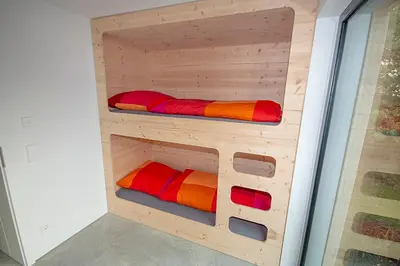 Ein Etagenbett oder Etagenbetten in einem Zimmer der Unterkunft Historisches Wohnen modern interpretiert