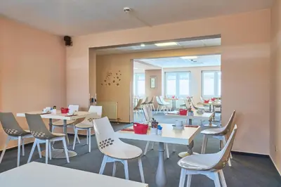 Ein Sitzbereich in der Unterkunft eXo Individual Hotel Waghäuseler Hof