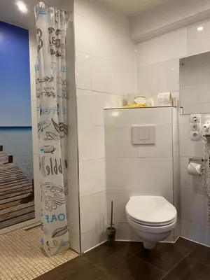 Ein Badezimmer in der Unterkunft Marktplatzhotel - Restaurant Tafelspitz