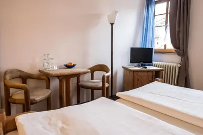 Ein Bett oder Betten in einem Zimmer der Unterkunft Marktplatzhotel - Restaurant Tafelspitz