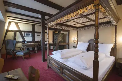 Ein Bett oder Betten in einem Zimmer der Unterkunft Hotel Ochsen Post