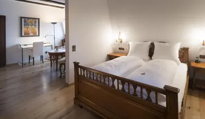 Ein Bett oder Betten in einem Zimmer der Unterkunft Hotel Ochsen Post