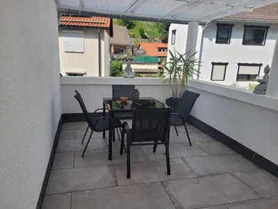 Ein Balkon oder eine Terrasse in der Unterkunft Ferienwohnung Jasmin in Schönau bei Heidelberg Fewo 1 mit Terrasse