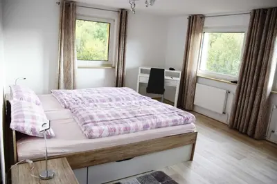 Ein Bett oder Betten in einem Zimmer der Unterkunft Ferienhaus Modautaler Sonnenhang