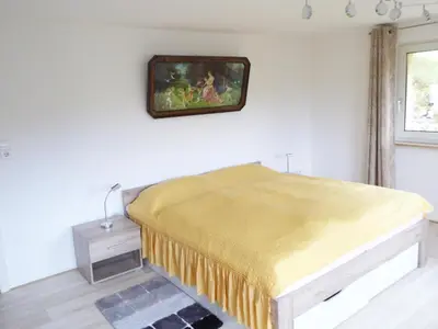 Ein Bett oder Betten in einem Zimmer der Unterkunft Ferienhaus Modautaler Sonnenhang