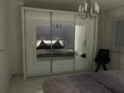 Ein Bett oder Betten in einem Zimmer der Unterkunft Moderne 2 Zimmer Wohnung mit Vollausstattung