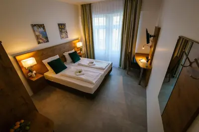 Ein Bett oder Betten in einem Zimmer der Unterkunft Hotel Waibstadter Hof