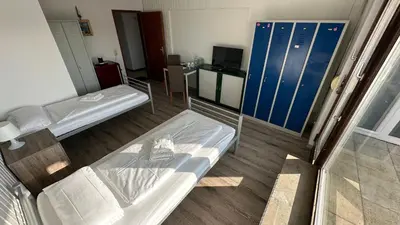Ein Bett oder Betten in einem Zimmer der Unterkunft Hotel Ditzingen