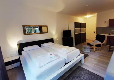 Ein Bett oder Betten in einem Zimmer der Unterkunft CF13 30m2 Central with Terrace AC and Netflix