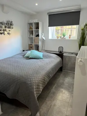 Ein Bett oder Betten in einem Zimmer der Unterkunft Ferienwohnung 