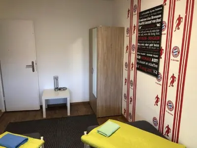 Ein Bett oder Betten in einem Zimmer der Unterkunft Unterkunft in Mainz Stadt