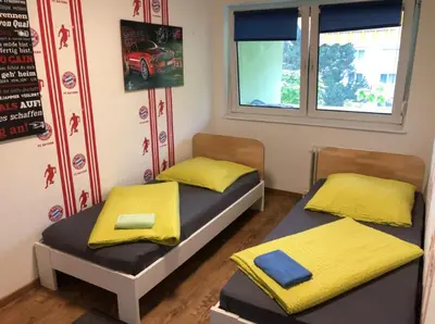 Ein Bett oder Betten in einem Zimmer der Unterkunft Unterkunft in Mainz Stadt