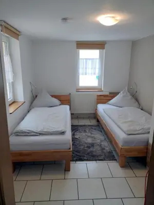 Ein Bett oder Betten in einem Zimmer der Unterkunft Ferienwohnung Gersprenztal