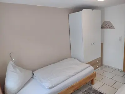 Ein Bett oder Betten in einem Zimmer der Unterkunft Ferienwohnung Gersprenztal