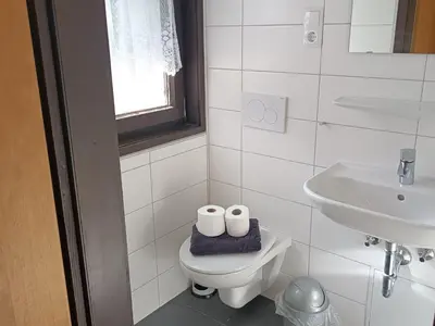 Ein Badezimmer in der Unterkunft Bungalow in Waldbrunn