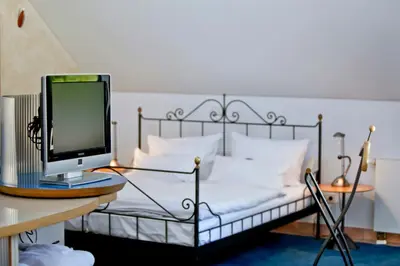 Ein Bett oder Betten in einem Zimmer der Unterkunft Hotel Watthalden
