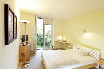 Ein Bett oder Betten in einem Zimmer der Unterkunft Hotel Watthalden