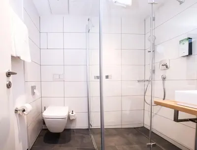 Ein Badezimmer in der Unterkunft Tulip Inn Ludwigshafen City