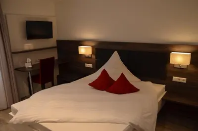 Ein Bett oder Betten in einem Zimmer der Unterkunft Hotel Restaurant Lamm