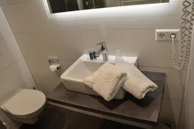 Ein Badezimmer in der Unterkunft Hotel Restaurant Lamm