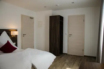 Ein Bett oder Betten in einem Zimmer der Unterkunft Hotel Restaurant Lamm