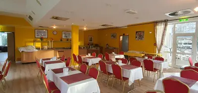 Ein Sitzbereich in der Unterkunft Flörsheimer Hof
