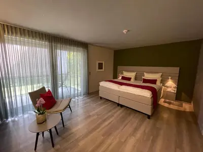 Ein Bett oder Betten in einem Zimmer der Unterkunft Schlosshotel Monrepos
