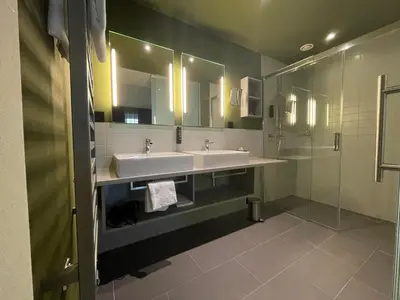 Ein Badezimmer in der Unterkunft Schlosshotel Monrepos