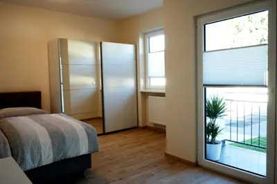 Ein Bett oder Betten in einem Zimmer der Unterkunft BestBoarding24