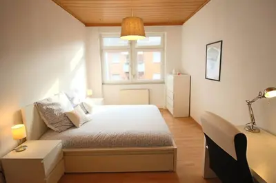 Ein Bett oder Betten in einem Zimmer der Unterkunft Charmante Wohnung ruhig und zentral gelegen