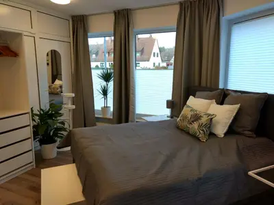 Ein Bett oder Betten in einem Zimmer der Unterkunft Strietpartment - 2 Schlafzimmer, viel Raum und Ruhe