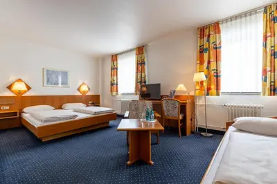Ein Bett oder Betten in einem Zimmer der Unterkunft Fly Inn Hotel Frankfurt Airport Rüsselsheim ehemals Trip Inn Hotels