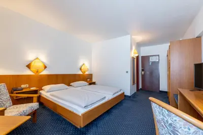 Ein Bett oder Betten in einem Zimmer der Unterkunft Fly Inn Hotel Frankfurt Airport Rüsselsheim ehemals Trip Inn Hotels