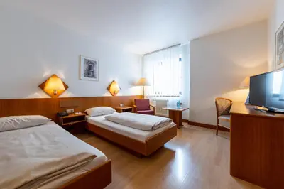 Ein Bett oder Betten in einem Zimmer der Unterkunft Fly Inn Hotel Frankfurt Airport Rüsselsheim ehemals Trip Inn Hotels