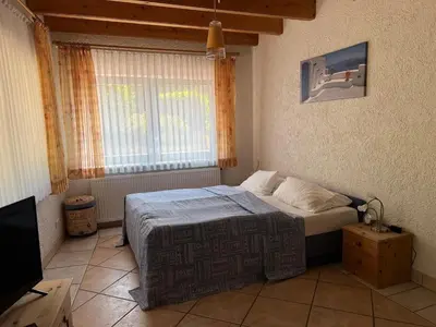 Ein Bett oder Betten in einem Zimmer der Unterkunft Glattbacher Hof Ferienwohnung 8