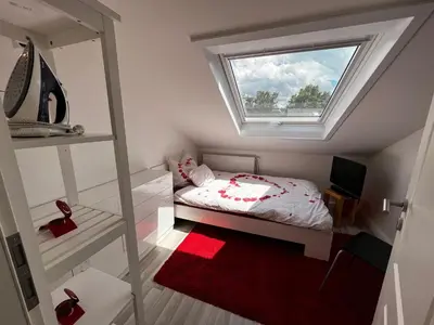 Ein Bett oder Betten in einem Zimmer der Unterkunft Ferienwohnung Schlüter Nußloch