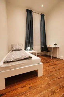 Ein Bett oder Betten in einem Zimmer der Unterkunft Appartement Deluxe, Monteurwohnung