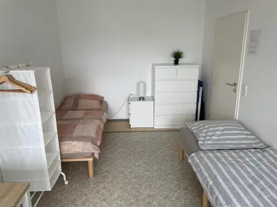 Ein Bett oder Betten in einem Zimmer der Unterkunft Nice, cosy and central apartment with big balcony