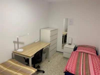 Ein Bett oder Betten in einem Zimmer der Unterkunft Nice, cosy and central apartment with big balcony