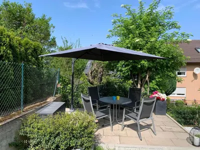 Ein Garten an der Unterkunft Apartment nähe Ettlingen - 15 min zur Messe Karlsruhe
