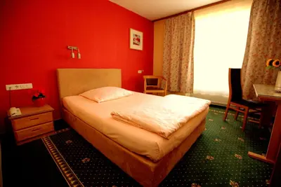 Ein Bett oder Betten in einem Zimmer der Unterkunft Airport Hotel Walldorf