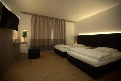 Ein Bett oder Betten in einem Zimmer der Unterkunft Airport Hotel Walldorf