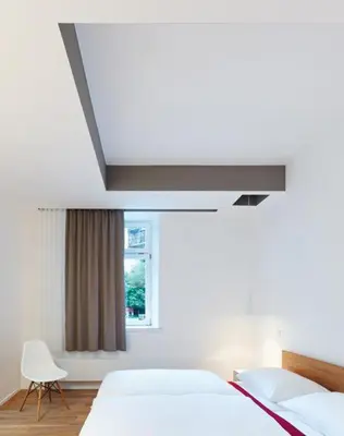 Ein Bett oder Betten in einem Zimmer der Unterkunft seehaus forelle haeckenhaus