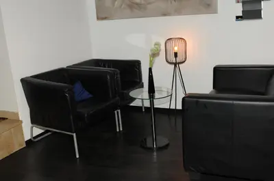 Ein Sitzbereich in der Unterkunft hogh Hotel Heilbronn