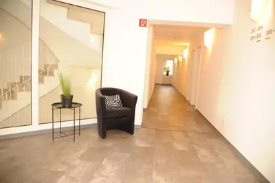 Ein Sitzbereich in der Unterkunft hogh Hotel Heilbronn